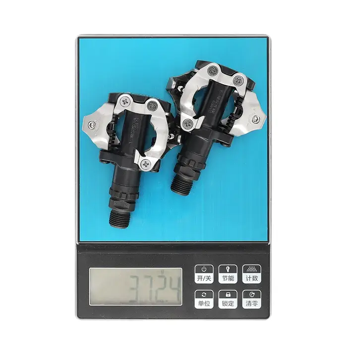 Système de pédales Shimano M520 SPD double face - Fixation facile avec roulements étanches pour une durabilité accrue en cyclisme