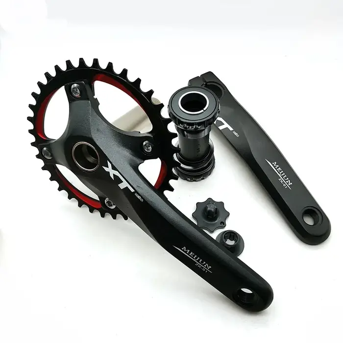 Pédalier intégré MTB Hollowtech en alliage d'aluminium robuste pour VTT et croiseurs avec plateau multi-dents et design coloré pour montagne