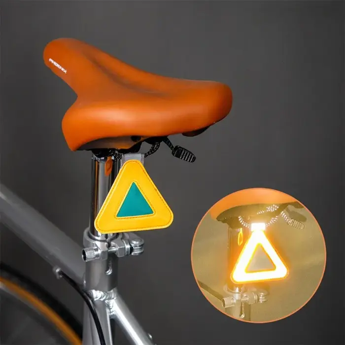 Plaque réfléchissante suspendue pour selle de vélo