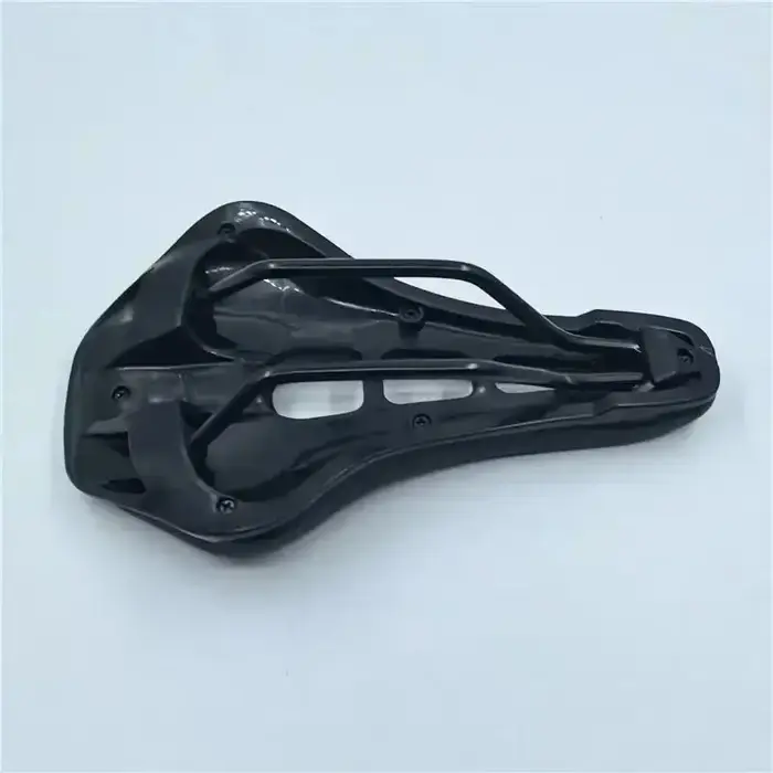 Selle de vélo de route en PU, ultralégère, creuse, imperméable, ergonomique, pour l'entraînement et l'exercice à vélo.