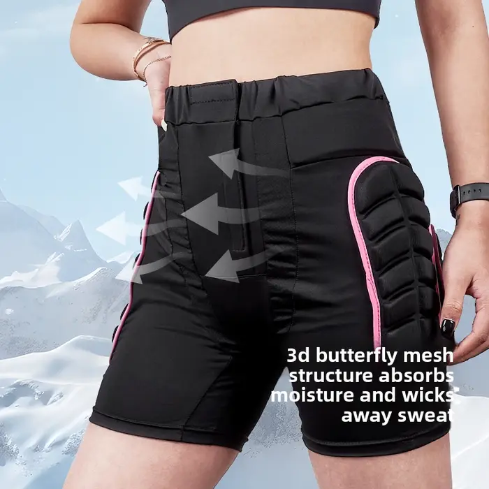 Short de sport de vélo pour femme rose avec protection rembourrée des hanches pour skate ski et patinage en coton polyester