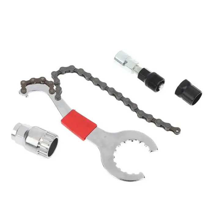 Kit d'outils de réparation de vélo avec accessoires complets, comprenant un extracteur de manivelle, un fouet à chaîne et une clé à pédale, pour la réparation de vélos de montagne et de route.